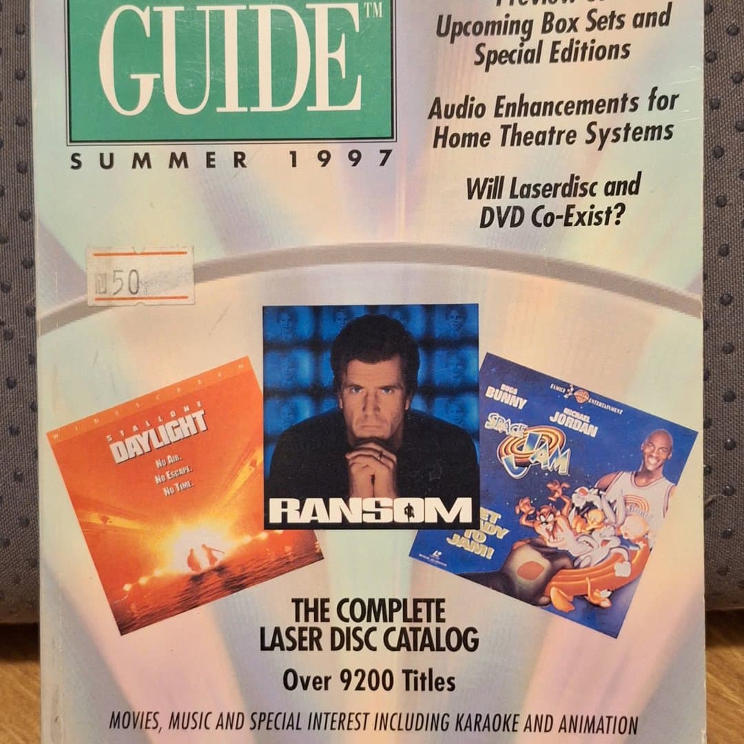 1997 Laser Video Guide catalog with over 9200 LaserDisc titles and a premier DVD guide. on Save All