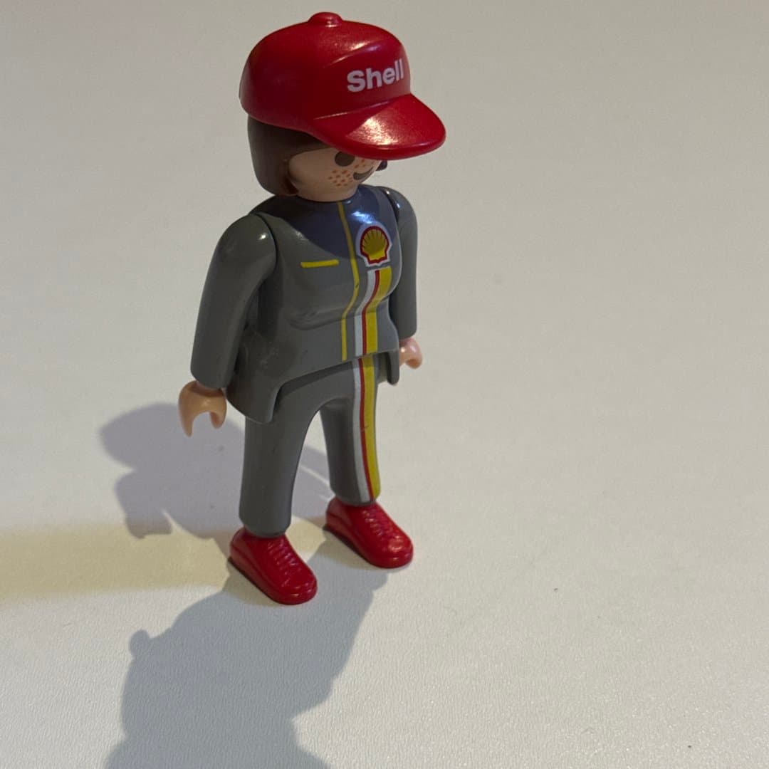 Playmobil Geobra figure dressed as a Shell employee with red cap and uniform. on Save All
