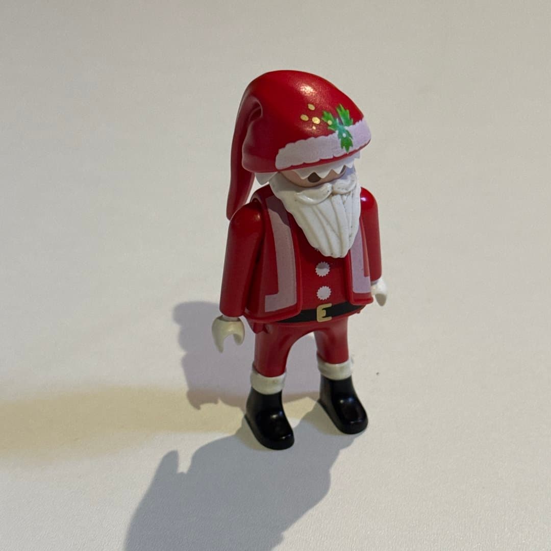 A vintage 2000 Playmobil Geobra Santa Claus figure, red suit with white trim and black boots. on Save All