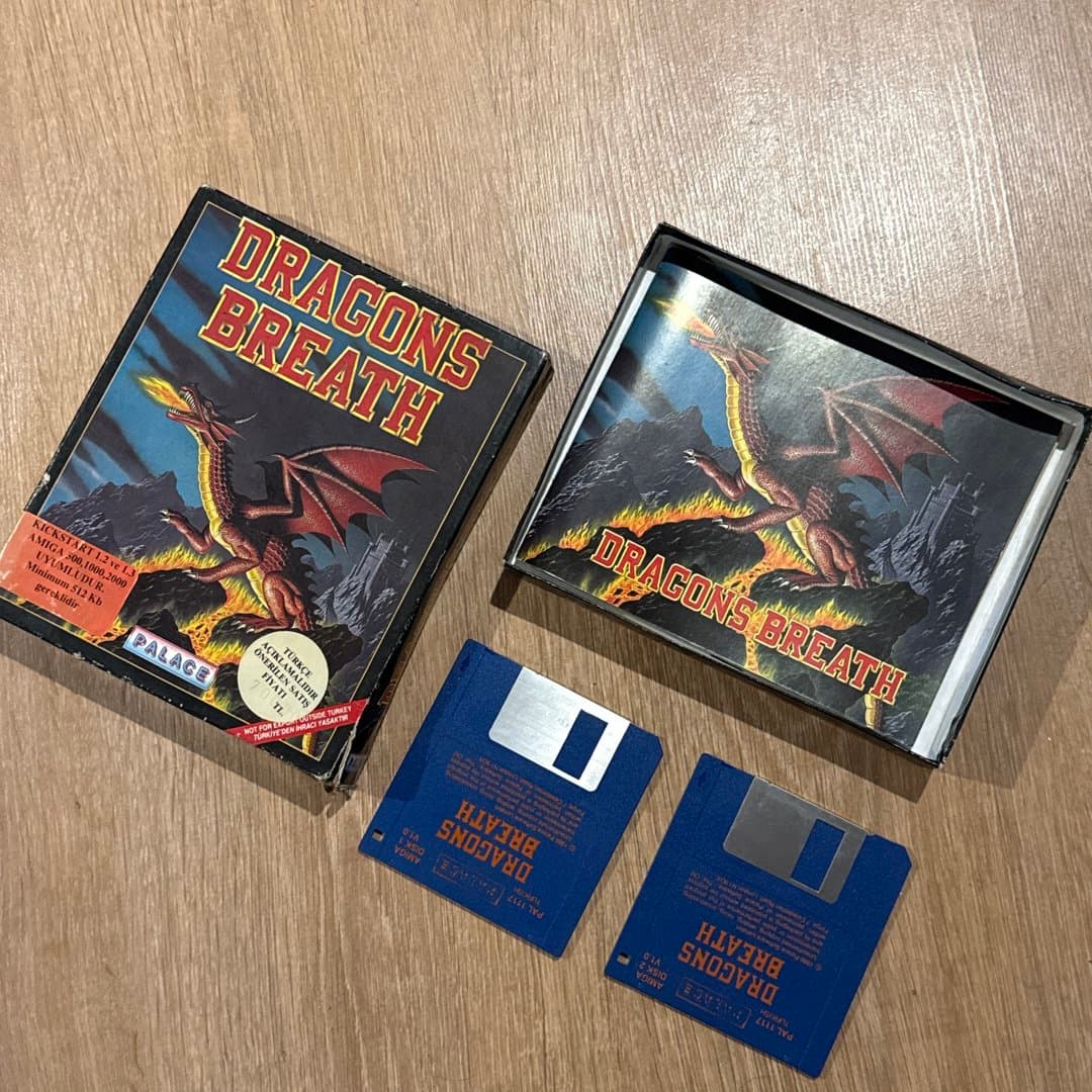 Vintage Amiga game 'Dragons Breath' on floppy disks, a classic 1990 title with Turkish localization. on Save All